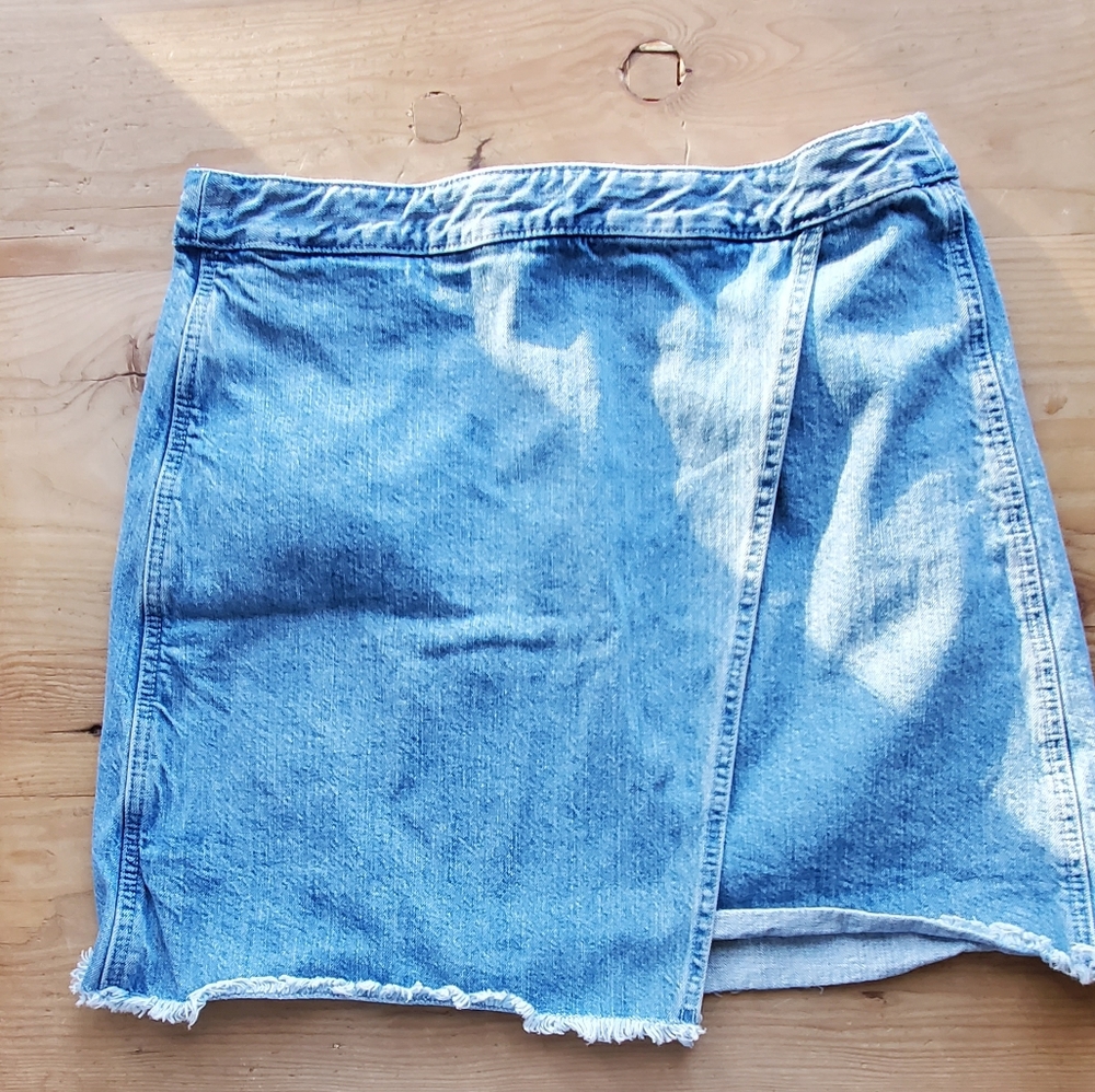 Cute Loft jean mini skirt. Size 10 distressed hem